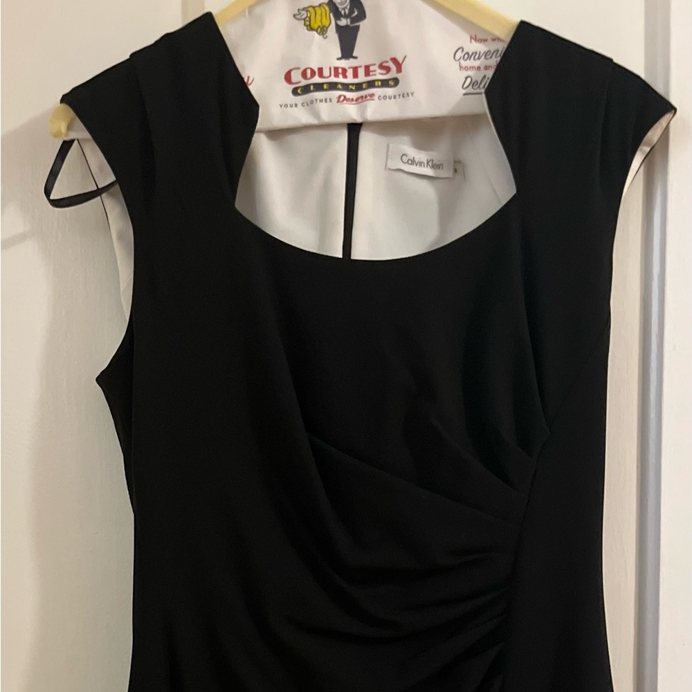 Calvin Klein size 8 black cocktail dress. Like new only worn a few times.